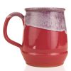 The back of the Bones Coffee Company Coco Crush hand thrown mug. It is a dark magenta color and has a white lavender glaze on top of it.