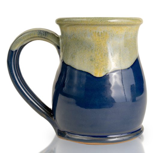 The back of the Lucy hand thrown mug. It is powder blue colored with a white and yellow glaze on top.