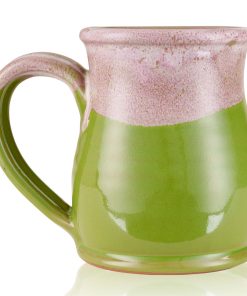 The back of the Bones Coffee Company Goofy Goober Sundae hand thrown mug. It is moss green colored and has a pink and white glaze on top of it.