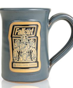 The front of the Bones Coffee Company Maximus hand thrown mug with the Valiant Vanilla art on the golden medallion. It is inspired by Zenimax and Amazon’s Fallout show. The mug is gray colored.