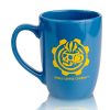 The back of the Vault Tech ceramic mug has a yellow Bones Coffee Company logo. The logo is of a skull that looks like a mug with steam coming out of it surrounded by a gear. The ceramic mug is colored blue.