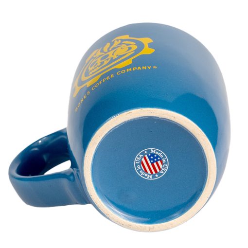 The bottom of the Vault Tech ceramic mug. The mug is colored blue, and it says it is made in the USA.
