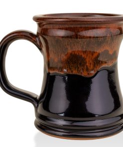 The back of the Bones Coffee Company Murder Hornet hand thrown mug. It is a black colored with a sunset orange glaze on top of it.